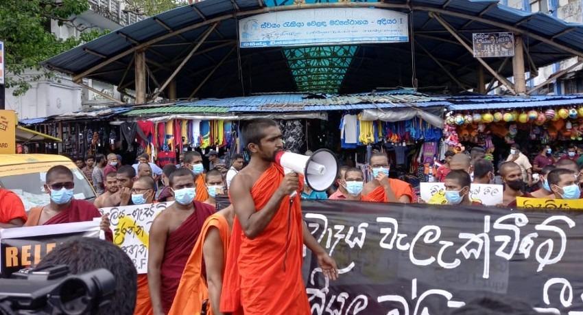 Student Monks protest against PTA; Demand release of IUSF activists